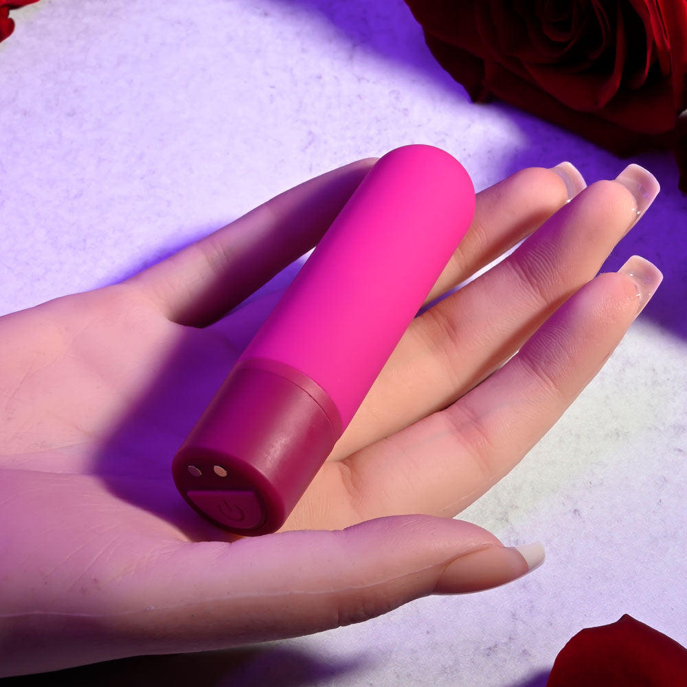 Selopa TINY TEMPTATION -  9.2 cm USB Rechargeable Bullet in a hand, showcasing its sleek design and versatility for intimate use.