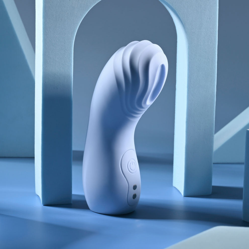 Selopa GOOD POINT -  USB Rechargeable Hollow Vibrating Finger Stimulator on blue background, showcasing its textured design.