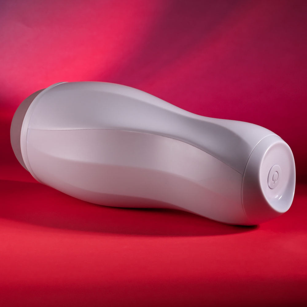 Selopa PLEASURE CAN - white intimate toy on a pink background, perfect for enhancing adult entertainment experiences.