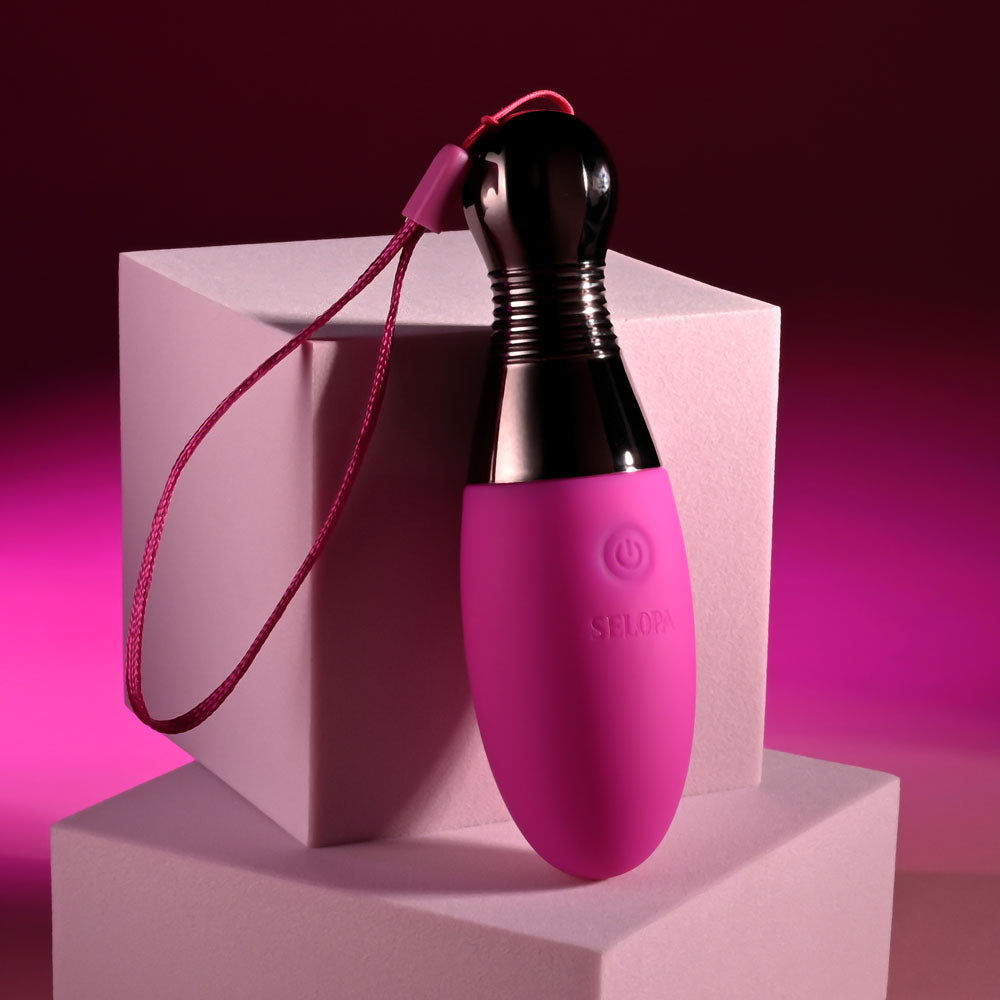 Selopa COMPANION -  11.9 cm USB Rechargeable Vibrating Egg with a sleek pink design on display.