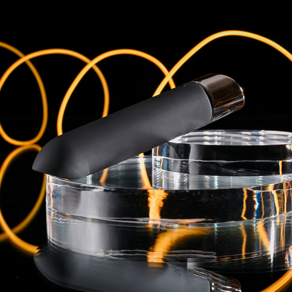 Selopa LITTLE BUDDY - 11.1 cm USB Rechargeable Vibrating Bullet on a reflective surface with stylish lighting.