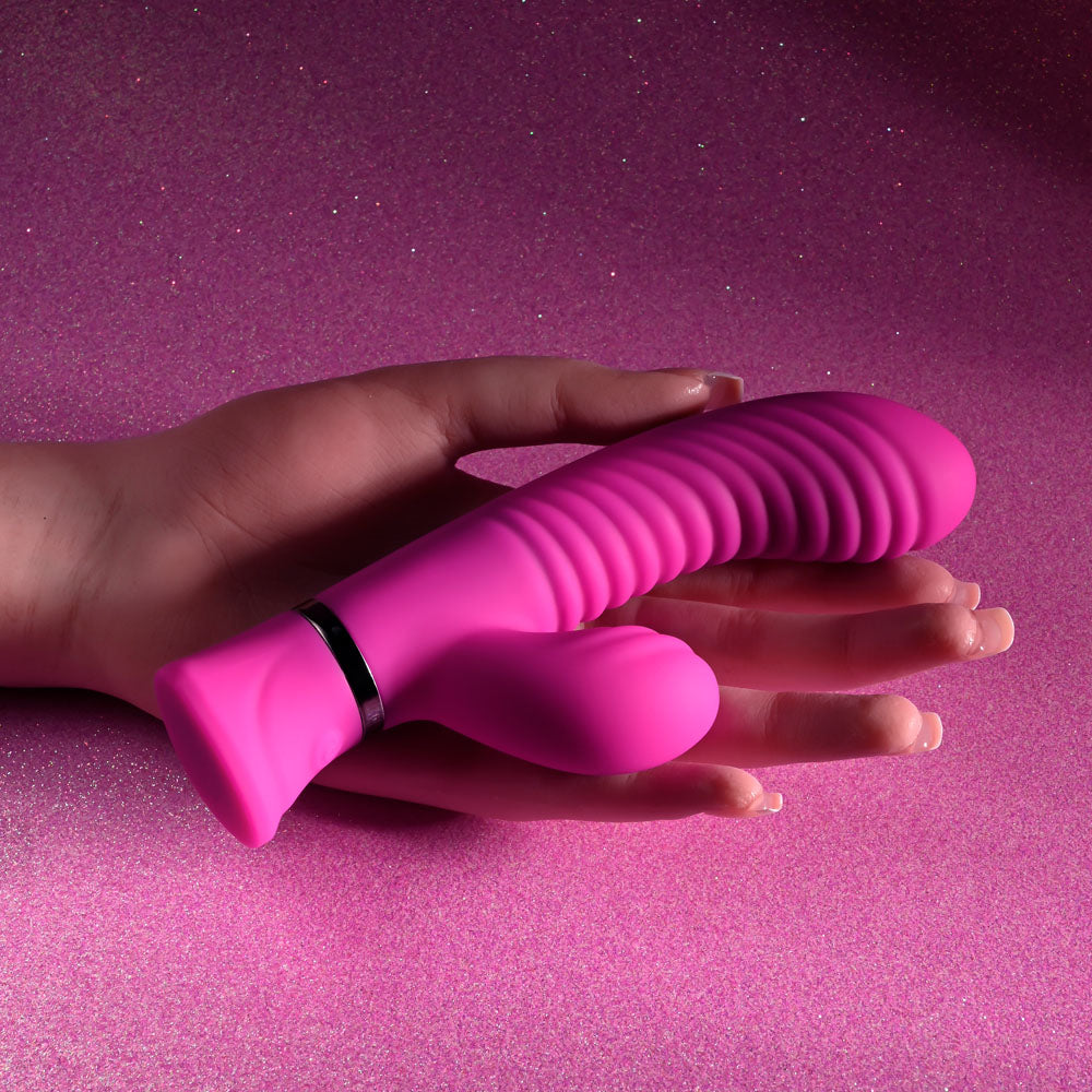 Selopa NEXT WAVE -  16.4 cm USB Rechargeable Dual Vibrator held in hand, showcasing wavy grooves and vibrant color.