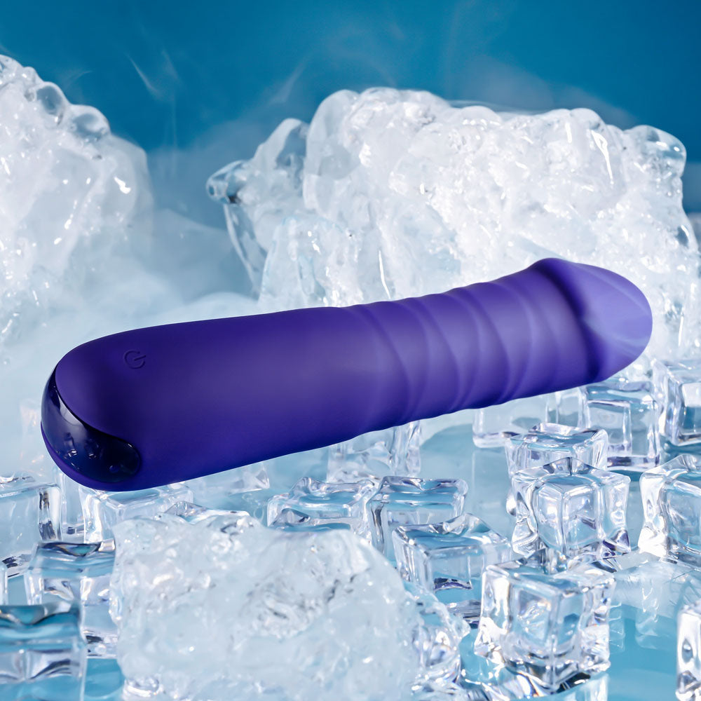 Selopa AMBITION - 17 cm USB Rechargeable Thrusting Vibrator on ice with a smooth purple surface.