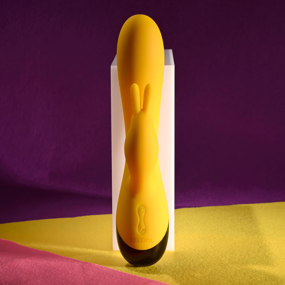 Selopa BUZZZ BUNNY -  19.7 cm USB Rechargeable Rabbit Vibrator displayed against vibrant background.