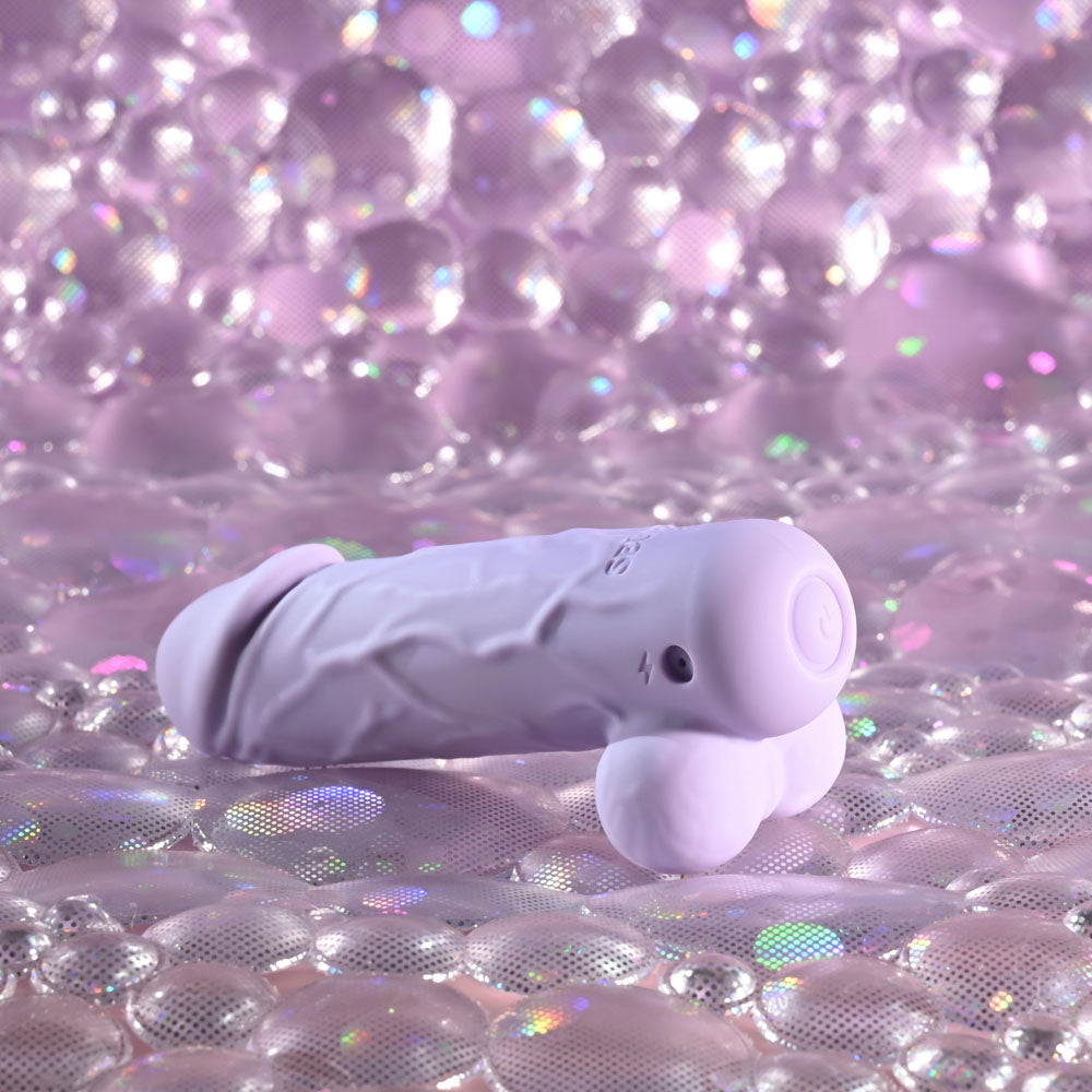 Selopa BALLSY BULLET -  9.2 cm USB Rechargeable Bullet on a shimmering background, showcasing its silicone design and vibrant features.