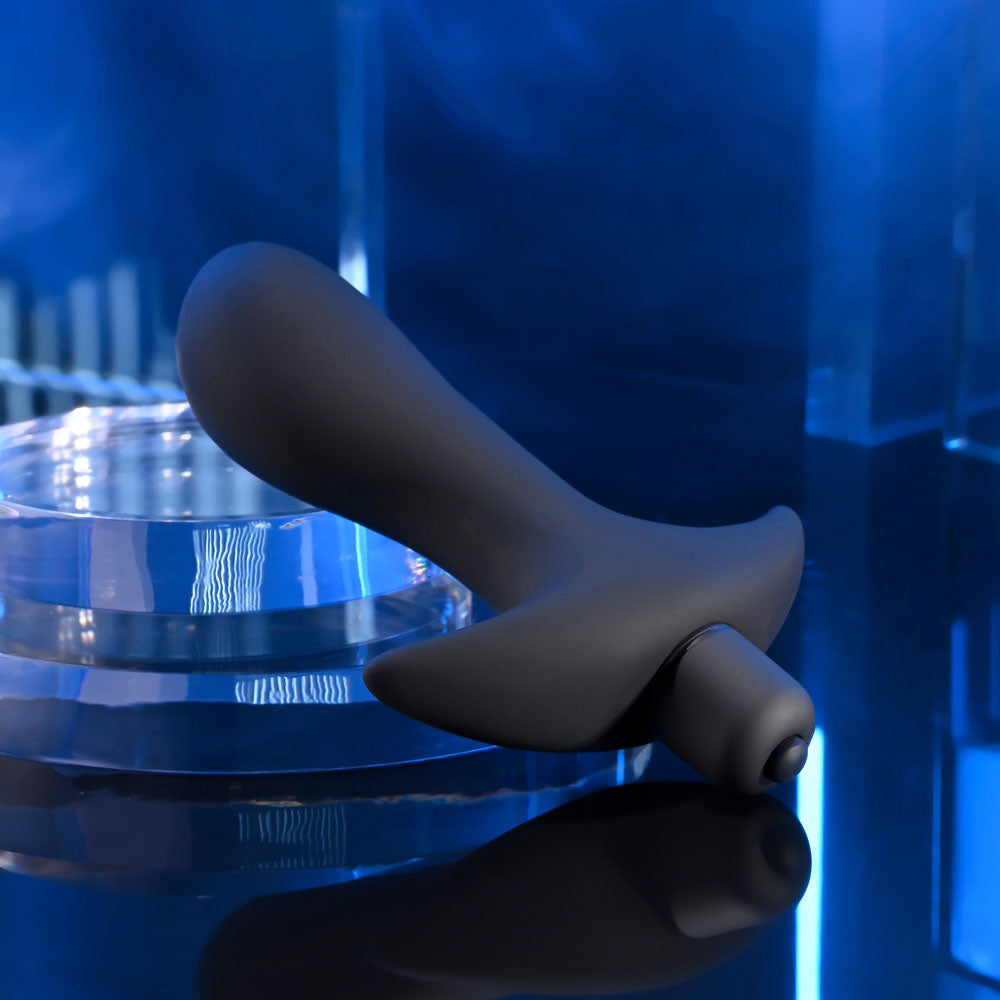 Selopa P-SPOT TRAINER -  12.7 cm Vibrating Prostate Massager on a reflective surface.