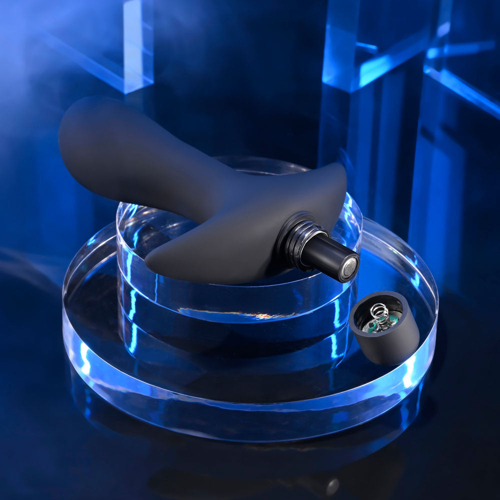 Selopa P-SPOT TRAINER - 12.7 cm Vibrating Prostate Massager on a reflective surface with blue lighting.