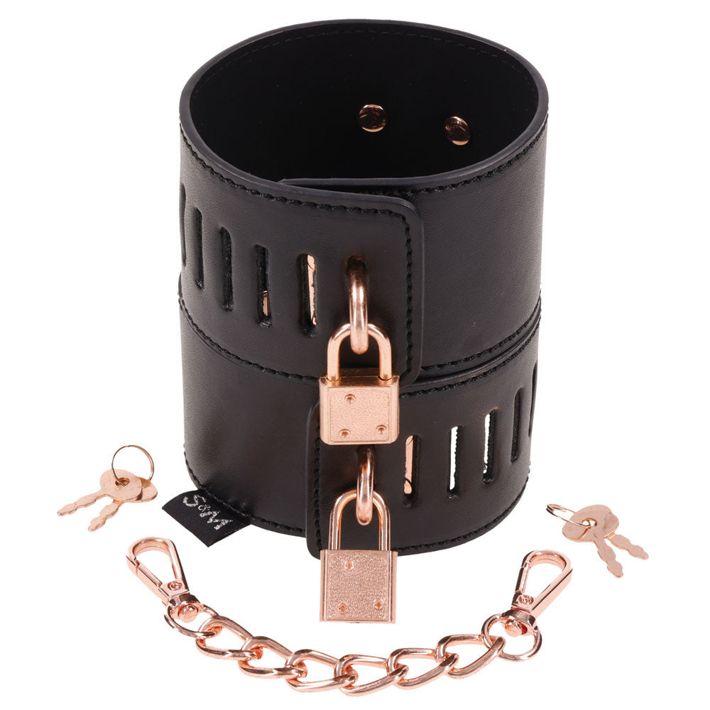 Sex & Mischief Brat Locking Cuffs - /Rose Gold Hand Cuffs with chain and keys on a white background.