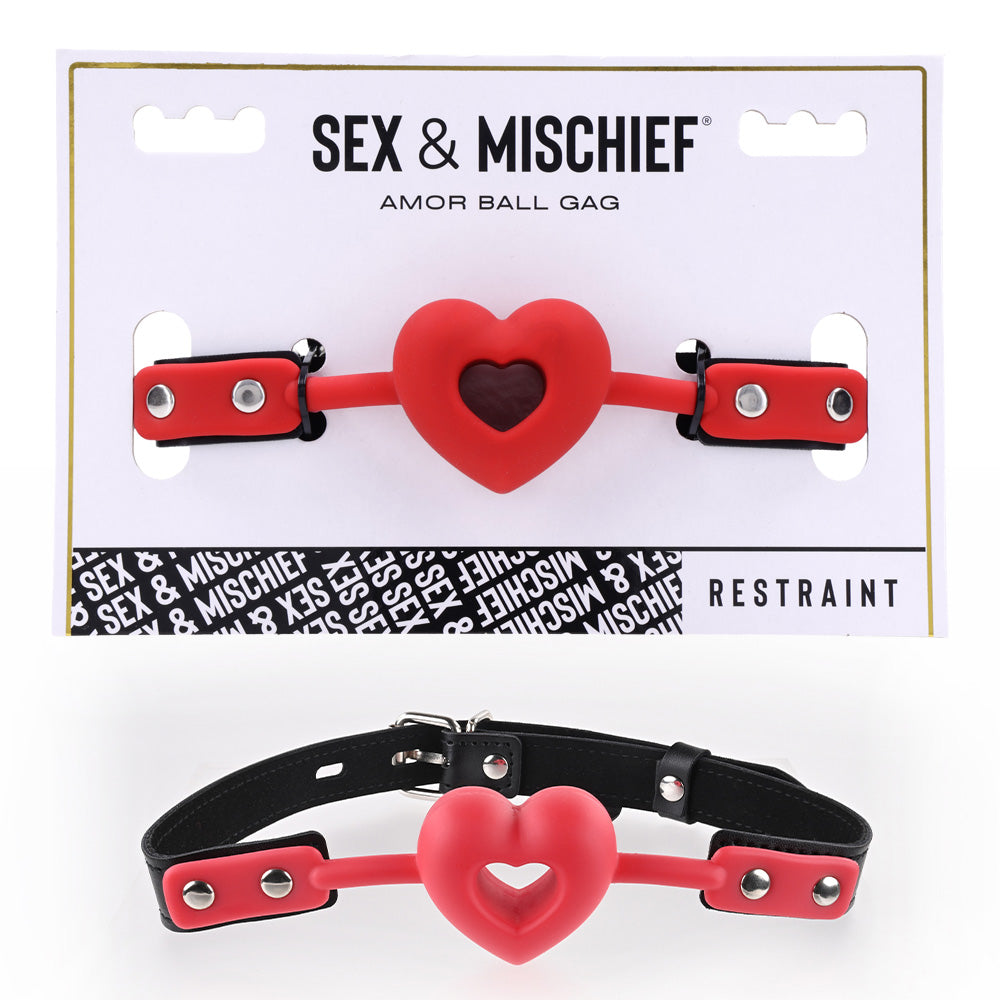 Sex & Mischief Amor Ball Gag - /Black Mouth Restraint featuring a heart-shaped gag on adjustable straps.