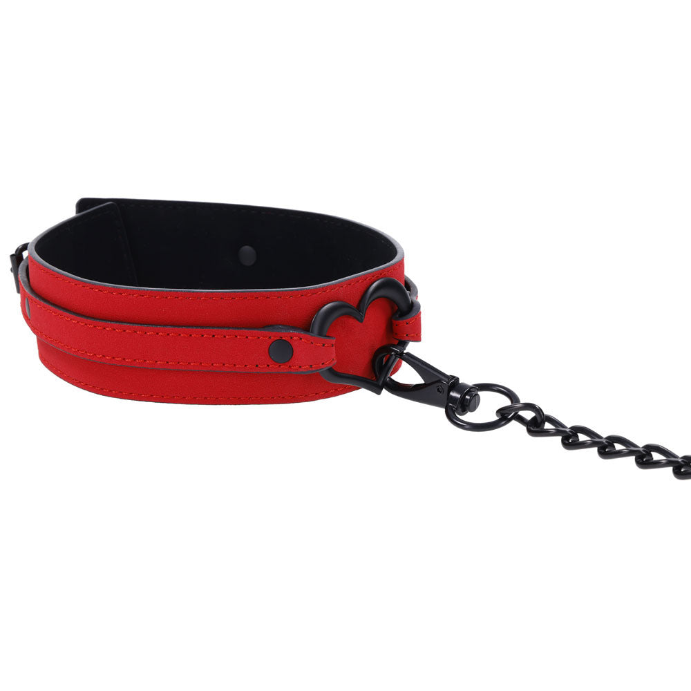 Sex & Mischief Amor Collar and Leash - Restraint in red vegan leather with silver heart detail for intimate essentials.