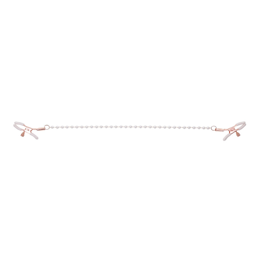 Sex & Mischief Peaches n CreaMe Pearl Nipple Clamps - Peach Nipple Restraints showcasing dual adjustable clamps with pearl accents.