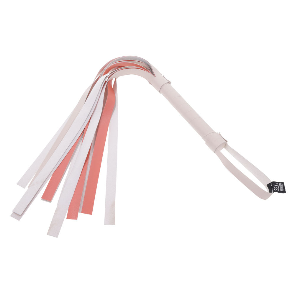 Sex & Mischief Peaches n CreaMe Stripe Flogger - Peach 80 cm Flogger Whip with a peach and white striped handle.