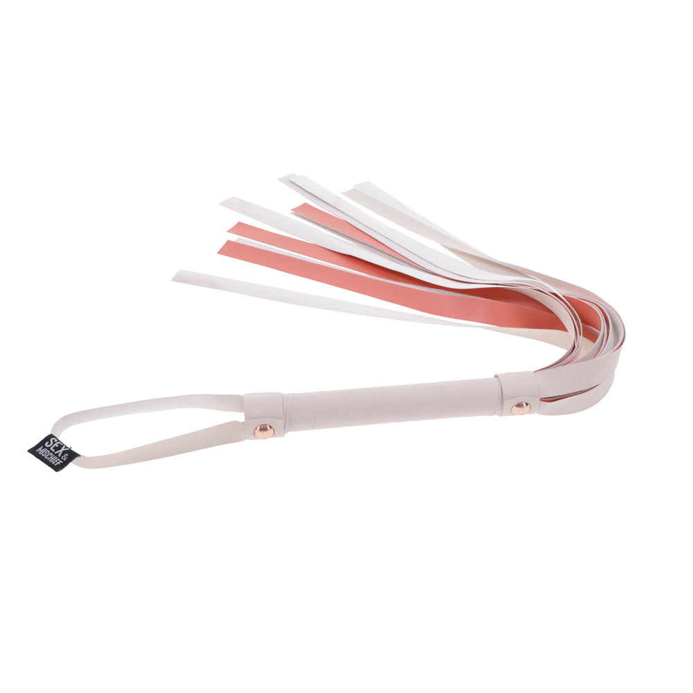 Sex & Mischief Peaches n CreaMe Stripe Flogger - Peach 80 cm Flogger Whip made of faux leather, featuring a striped handle.
