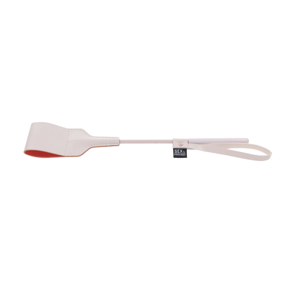 Sex & Mischief Peaches n CreaMe Riding Crop - Peach 30 cm Crop Whip shown in bright peach faux leather.