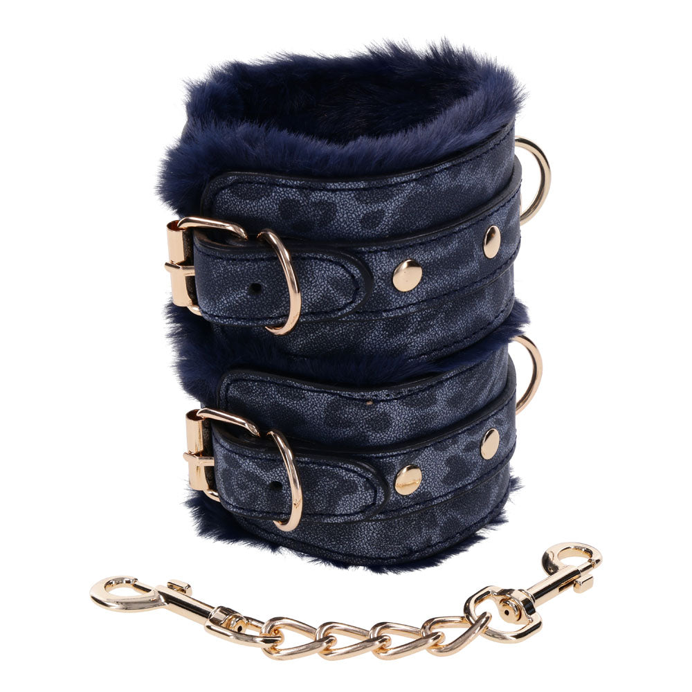 Sex & Mischief Cougar Fur Handcuffs - Navy /Gold Furry Restraints with plush faux fur and gold hardware.