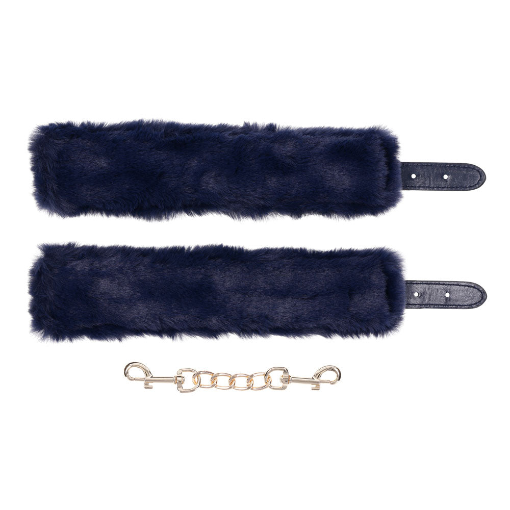 Sex & Mischief Cougar Fur Handcuffs - Navy /Gold Furry Restraints featuring luxurious faux fur and gold hardware.