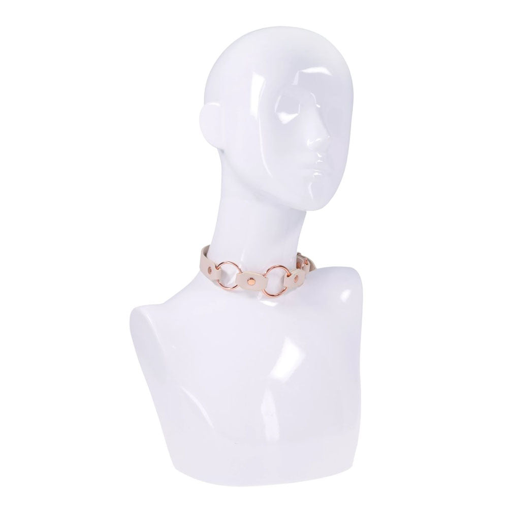 Sex & Mischief Peaches n CreaMe Ring Day Collar - Peach Bondage Collar displayed on a mannequin, showcasing its rose gold rings.