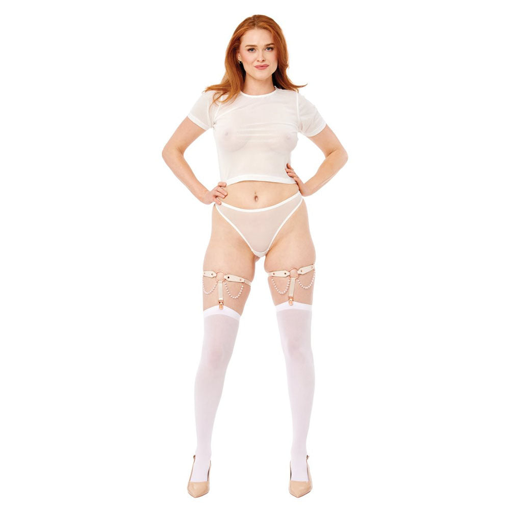 Sex & Mischief Peaches n CreaMe Pearl Garters - Peach / Rose Gold Garters with Pearls - Set of 2 model wearing white outfit
