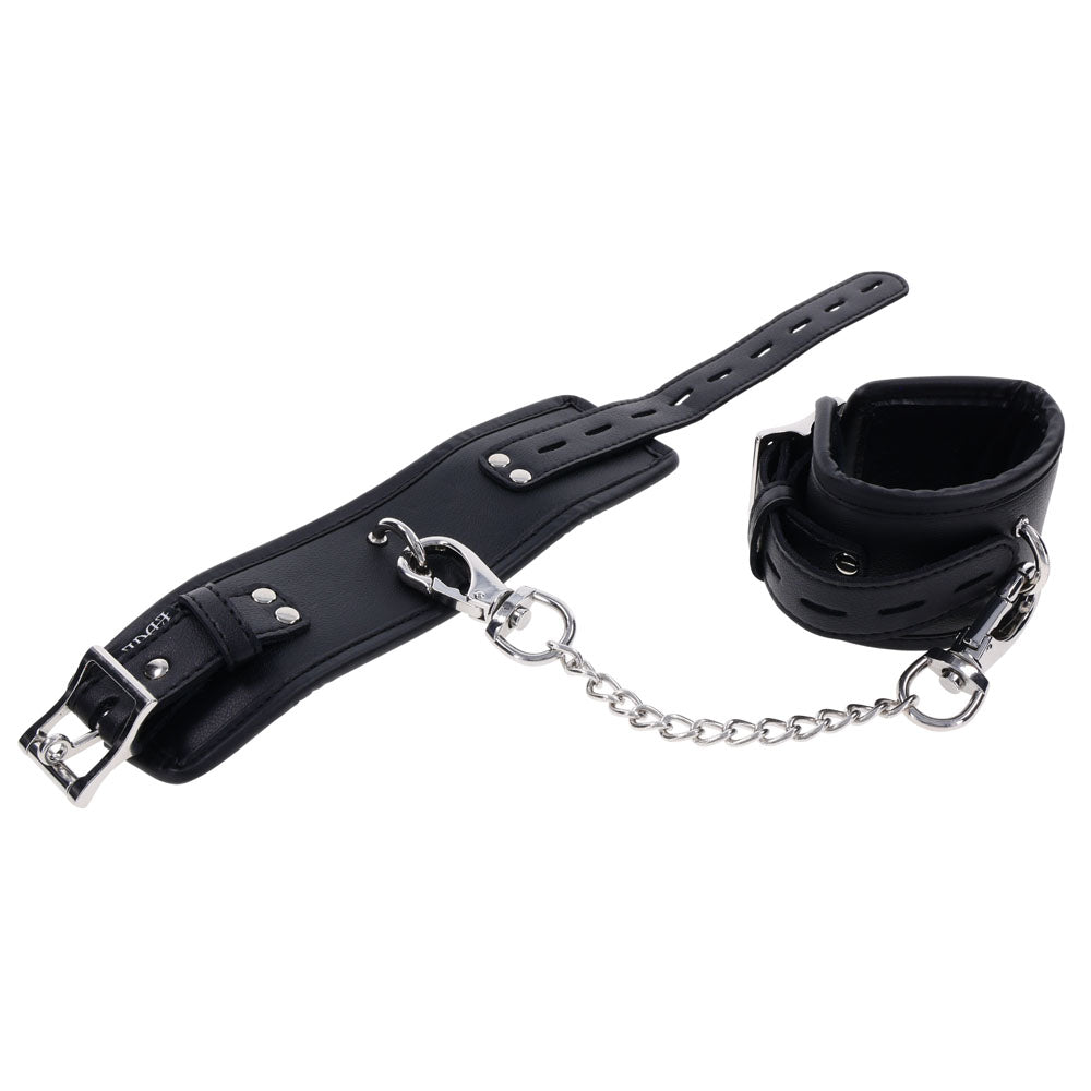 EDGE Handcuffs - Restraints featuring padded black cuffs with silver hardware for secure and comfortable restraint.