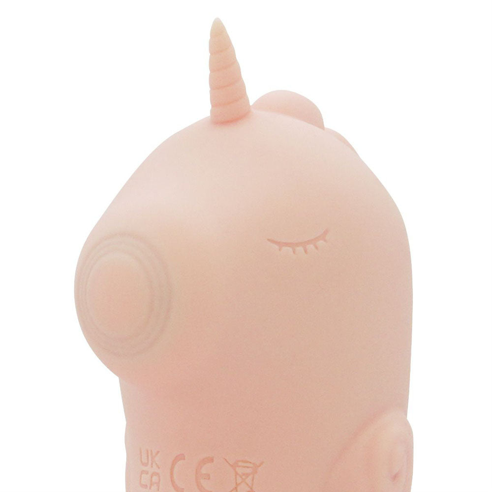 Unihorn - C Horse - Coral Throb - Coral USB Rechargeable Dual Unicorn Vibrator close-up of soft silicone design.