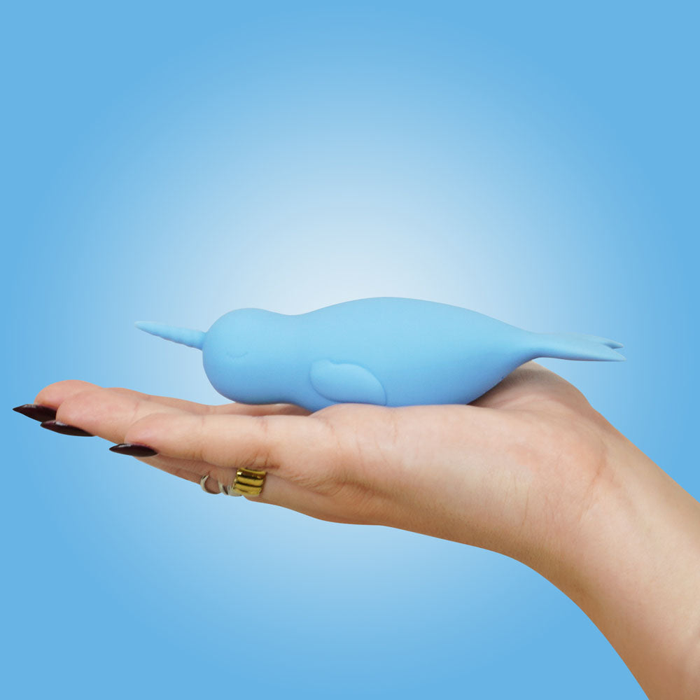 Unihorn of the Sea - Neigh Mo - The Narwhal - USB Rechargeable Dual Motor Stimulator in hand.