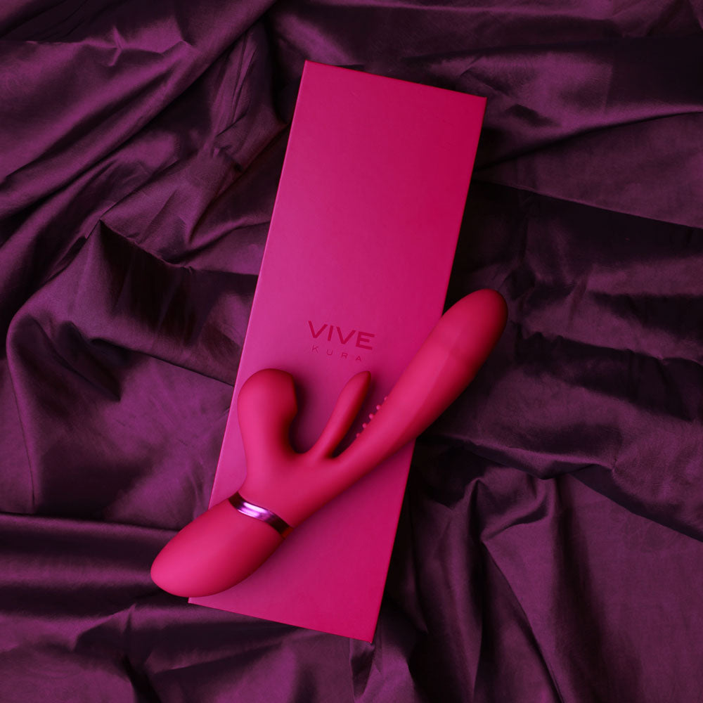 VIVE Ena -  -  25 cm USB Rechargeable Thrusting Vibrator with Air Wave Stimulator on a satin background.
