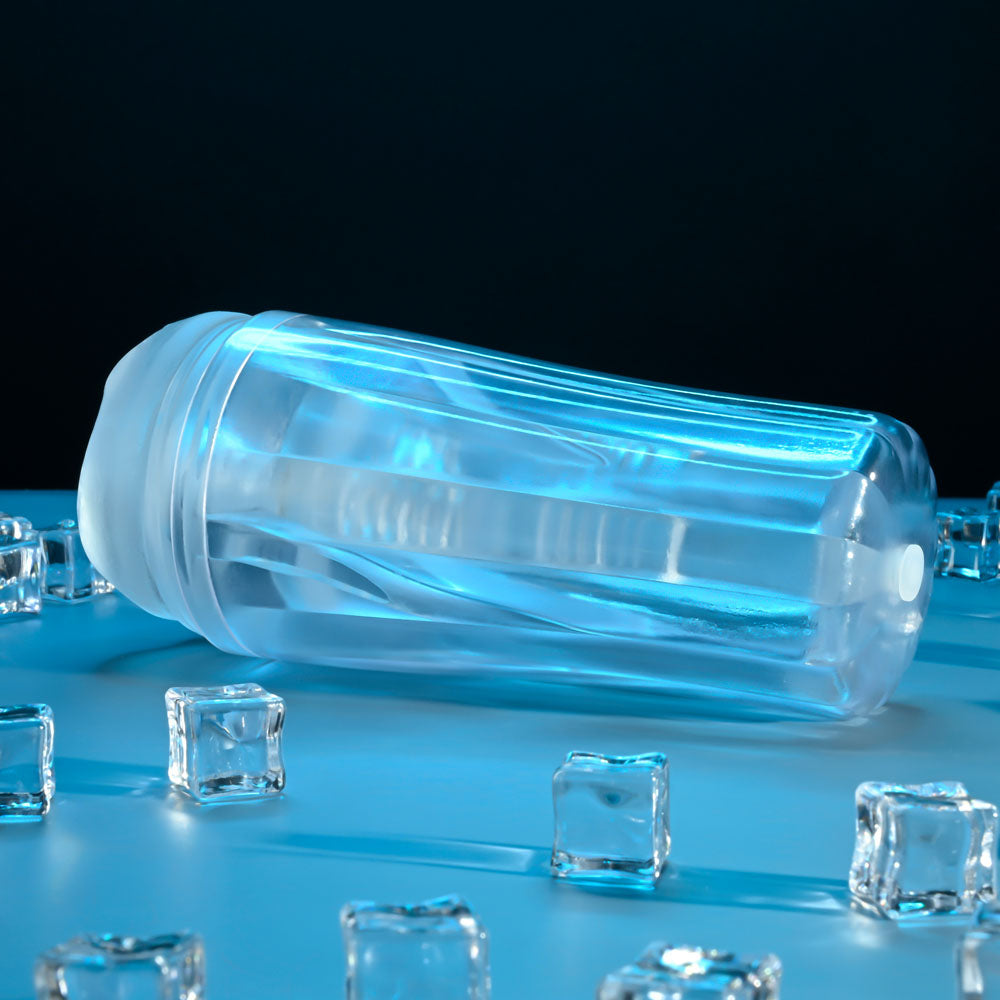 Zero Tolerance THE  CHOICE -  21 cm Vagina Stroker with a sleek transparent design surrounded by ice cubes.