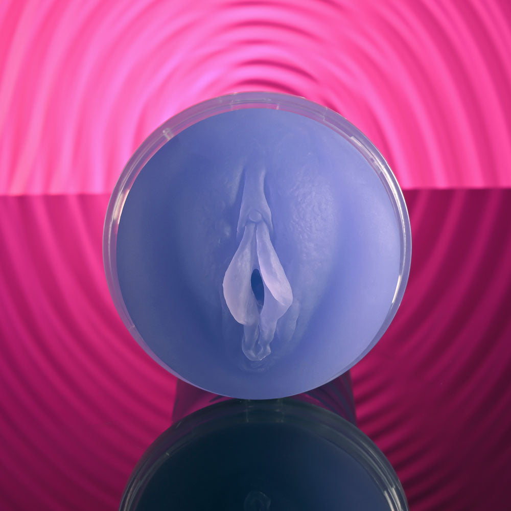 Zero Tolerance POP ON THE GLOW - Glow in Dark Vagina Stroker shown in purple with realistic design.