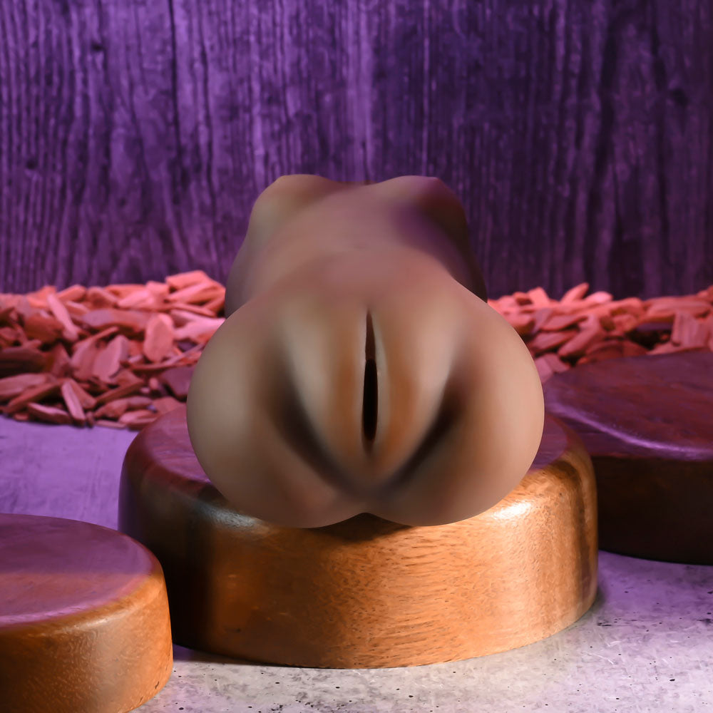Zero Tolerance SKLYER NICOLE WET N READY -  Vagina Stroker with Free Movie Download on a wooden base.