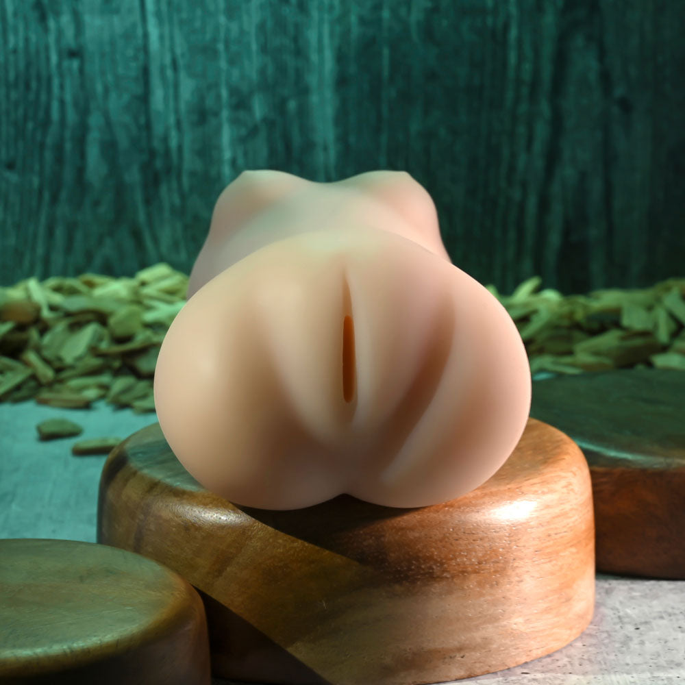 Zero Tolerance SASHA GREY WET N READY Stroker -  Vagina Stroker with Free Movie Download on a wooden base.