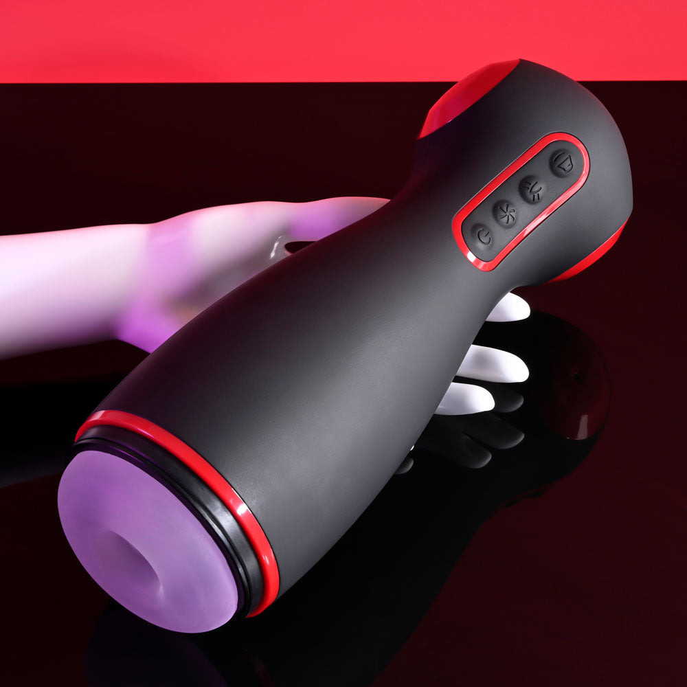 Zero Tolerance TIGHT SQUEEZE - USB Rechargeable Vibrating, Squeezing & Talking Stroker on a black surface.