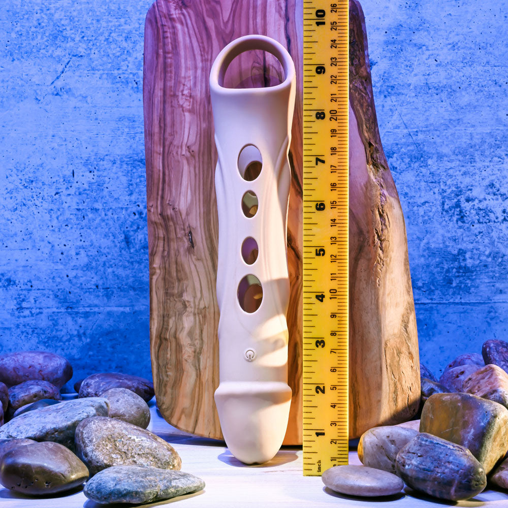 Zero Tolerance BIG BOY EXTENDER - Light - USB Rechargeable Vibrating Penis Extension Sleeve displayed with a ruler beside it.