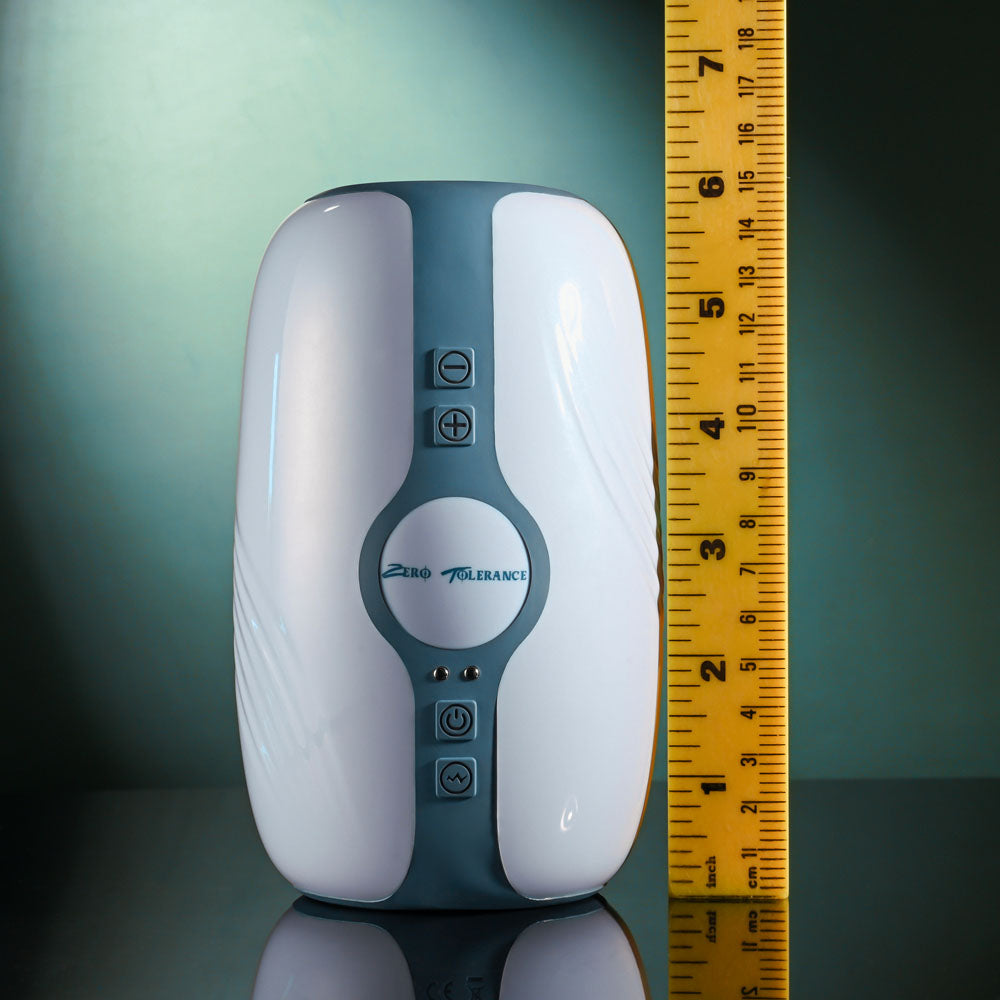 Zero Tolerance TOUCHDOWN - 15 cm USB Rechargeable Vibrating & Tightening Stroker with measurement ruler for size reference.