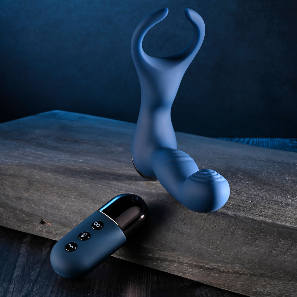 Zero Tolerance BY ALL MEANS -  13.4 cm USB Rechargeable Prostate Massager with Cock Ring on a wooden surface.