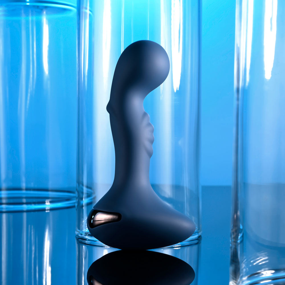 Zero Tolerance  OASIS -  12.3 cm USB Rechargeable Vibrating Anal Plug showcased against a glass backdrop.