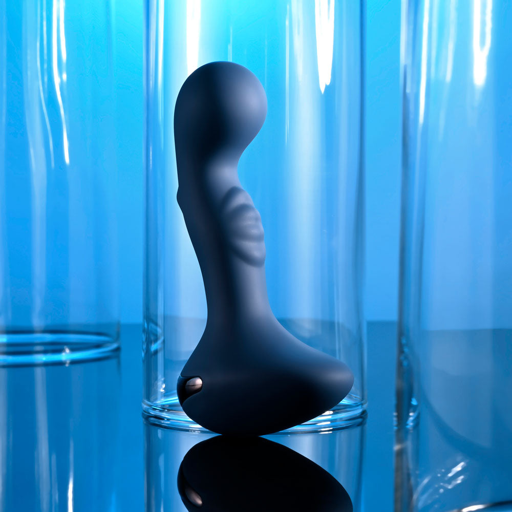 Zero Tolerance  OASIS -  12.3 cm USB Rechargeable Vibrating Anal Plug displayed against a blue background.