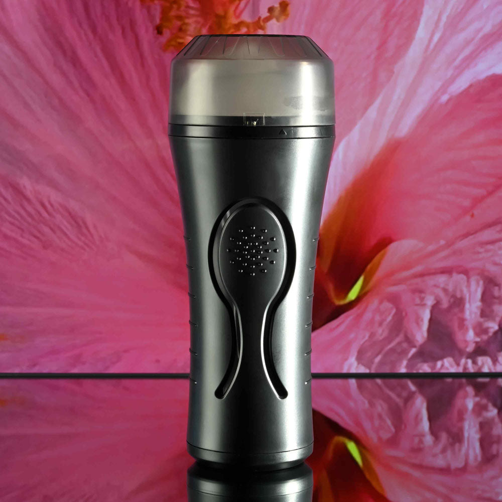 Zero Tolerance HOLD TIGHT -  USB Rechargeable Vibrating Vagina Stroker against vibrant pink background.