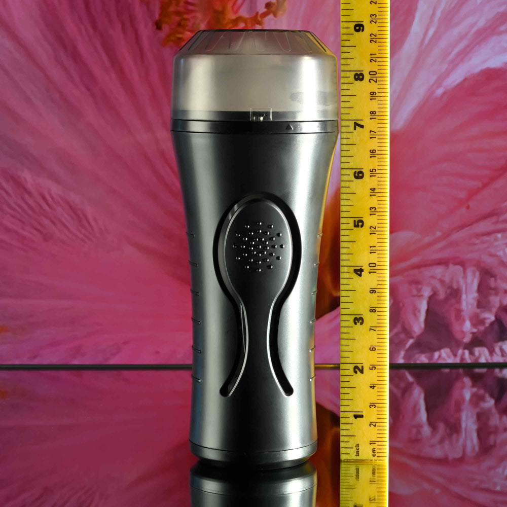Zero Tolerance HOLD TIGHT -  USB Rechargeable Vibrating Vagina Stroker next to a measuring tape for size reference.