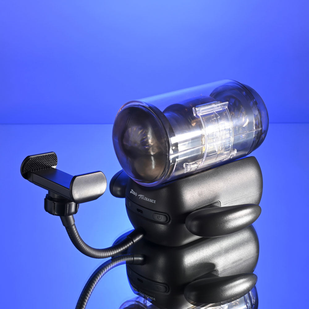 Zero Tolerance HOLD ME TIGHT -  USB Rechargeable Vibrating Auto Stroker with Phone Holder on display.