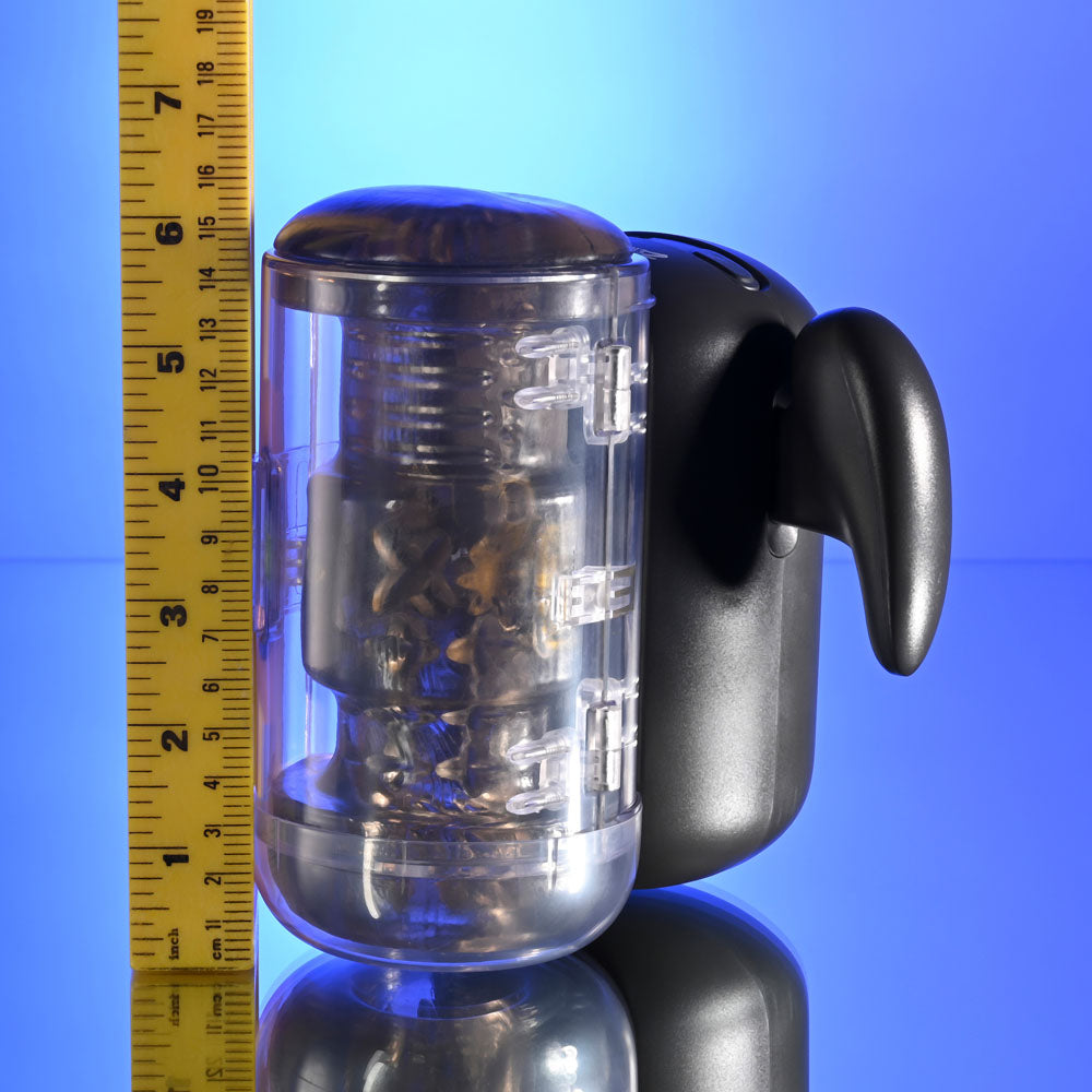 Zero Tolerance HOLD ME TIGHT -  USB Rechargeable Vibrating Auto Stroker with Phone Holder next to a measuring tape.